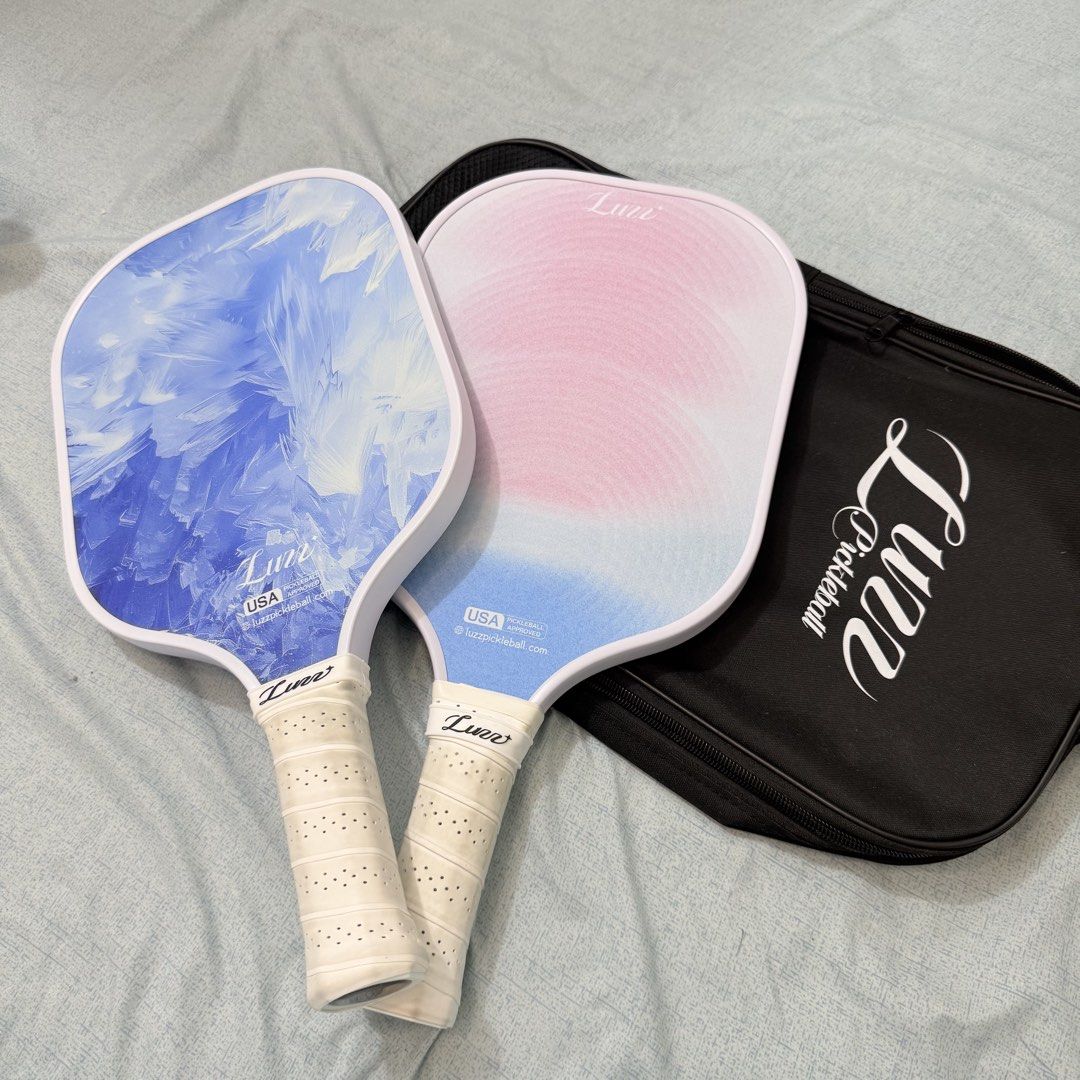 Luz Pickleball Paddle (SOLD AS SET) 2 pcs (Category: Racket and Ball Sports) located in Manila. Submitted by nikkipascu43203 (Listing ID 1423386736, Image 1). Description: Used only once. Practically brand new. Complete set: • 2 LUZZ paddles • Carry bag included RFS: Upgraded to a new paddle. Yung blue lang nagamit sa OP. Yung pink once lang nagamit. Perfect for beginners or casual players who want a quality starter set without paying full mall p