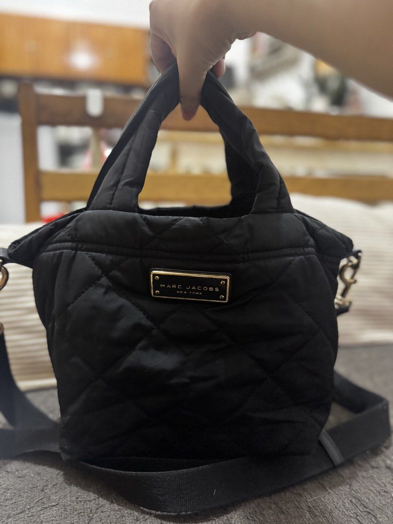 Marc Jacobs Quilted Nylon Mini tote (Category: Luxury Bags & Wallets) located in Manila. Submitted by happylittlekitten (Listing ID 1423377252, Image 1). Description: Marc Jacobs Quilted Nylon Mini tote bag Used but not abused Needs wash lang RFS: decluttering Shipping thru lalamove or jnt .