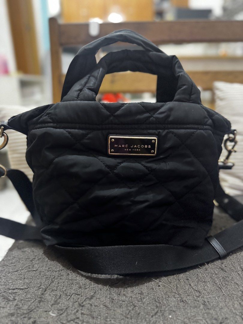 Marc Jacobs Quilted Nylon Mini tote (Category: Luxury Bags & Wallets) located in Manila. Submitted by happylittlekitten (Listing ID 1423377252, Image 2). Description: Marc Jacobs Quilted Nylon Mini tote bag Used but not abused Needs wash lang RFS: decluttering Shipping thru lalamove or jnt .