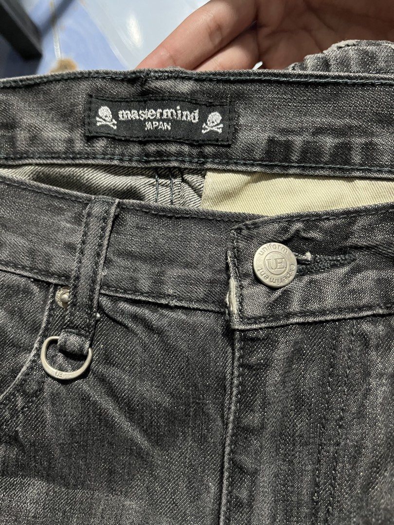Mastermind Japan x Uniform Experiment Jeans (Category: Jeans) located in Pasay City. Submitted by chokmvn (Listing ID 1423417807, Image 3). Description: These black jeans feature a skull and crossbones design on the front pocket and back. The jeans have a size 32 label and are made in China. They have a zipper pocket on the back and a leather patch. The jeans also have a Mastermind Japan tag on the waistband. kindly pm me on fb: marvin james borj