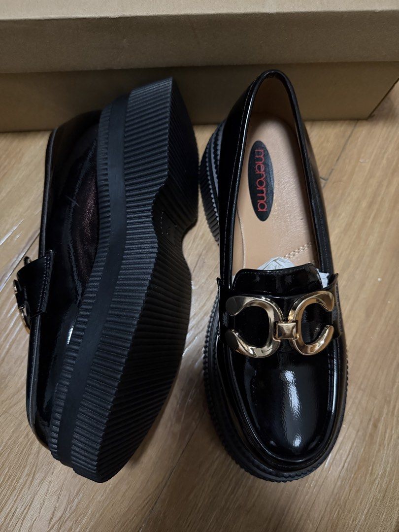 Meroma Black Loafers - Size 37 (Category: Loafers) located in Pasay City. Submitted by preiluuv (Listing ID 1423280513, Image 3). Description: - Meroma black loafers - Size: 37 EUR - Features a chunky sole - Gold-colored buckle detail - Includes original box.