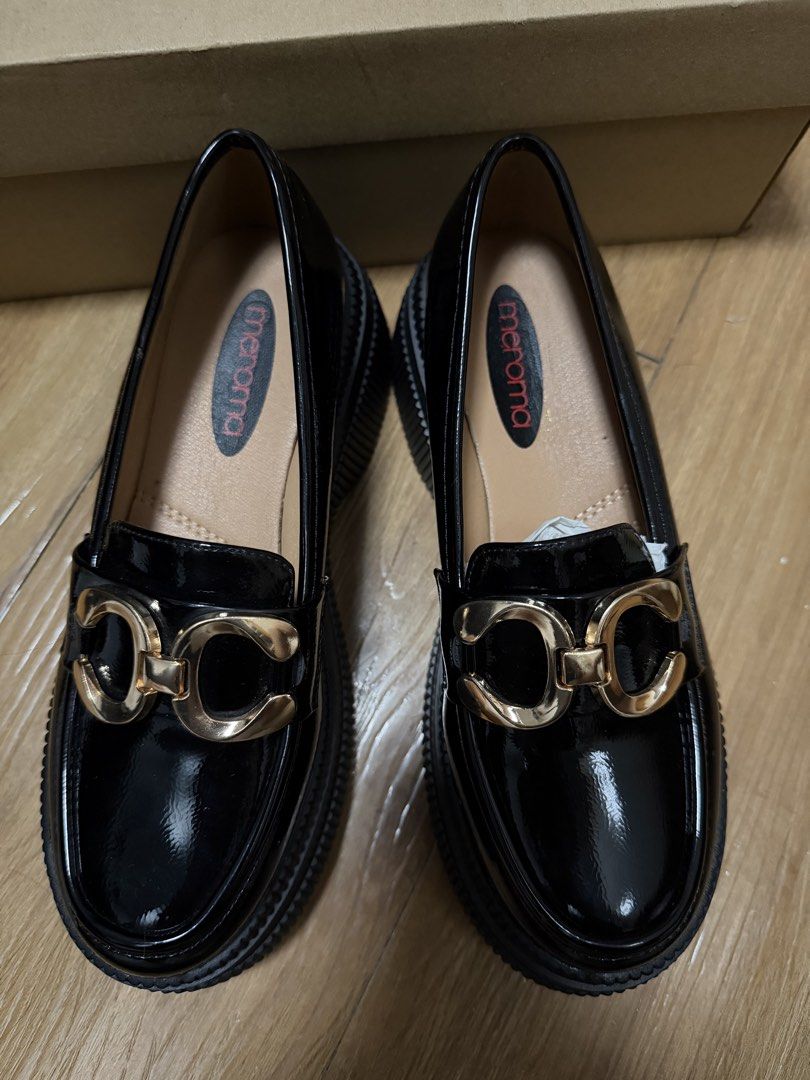 Meroma Black Loafers - Size 37 (Category: Loafers) located in Pasay City. Submitted by preiluuv (Listing ID 1423280513, Image 2). Description: - Meroma black loafers - Size: 37 EUR - Features a chunky sole - Gold-colored buckle detail - Includes original box.
