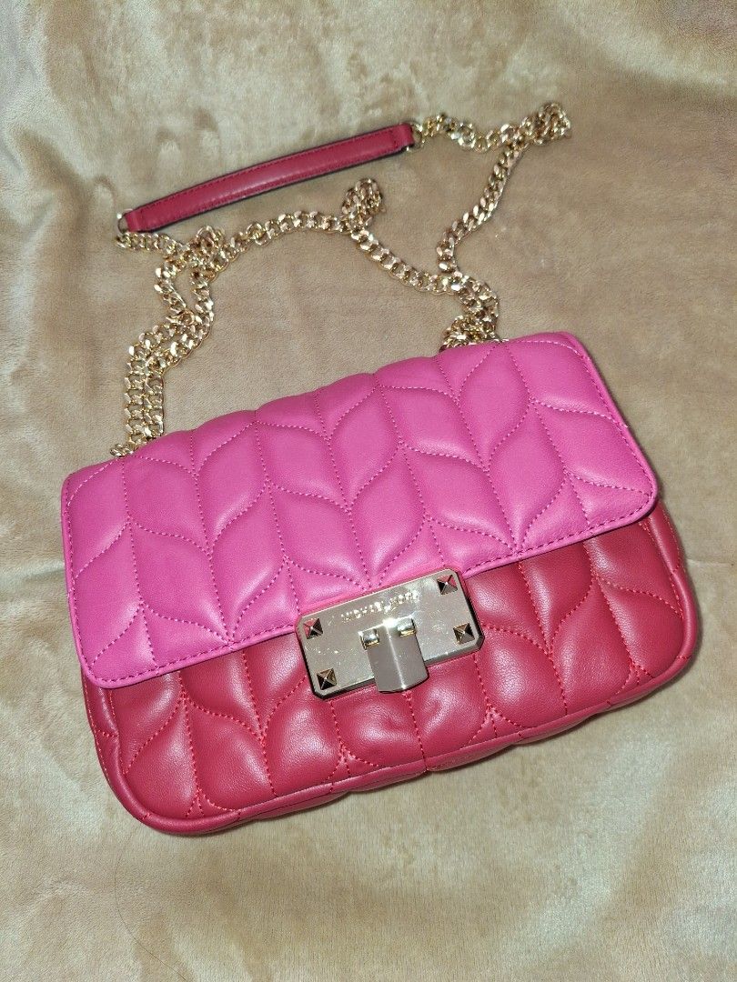 MK Red Pink Sling Bag (Category: Luxury Bags & Wallets) located in Imus. Submitted by clarizan08 (Listing ID 1423300064, Image 3). Description: from 4500 to 4,099 Price drop!!! Authentic MK Bag Gifted (never used) for United Kingdom Rare MK sling bag. Comes with gift card, tag and paper bag.