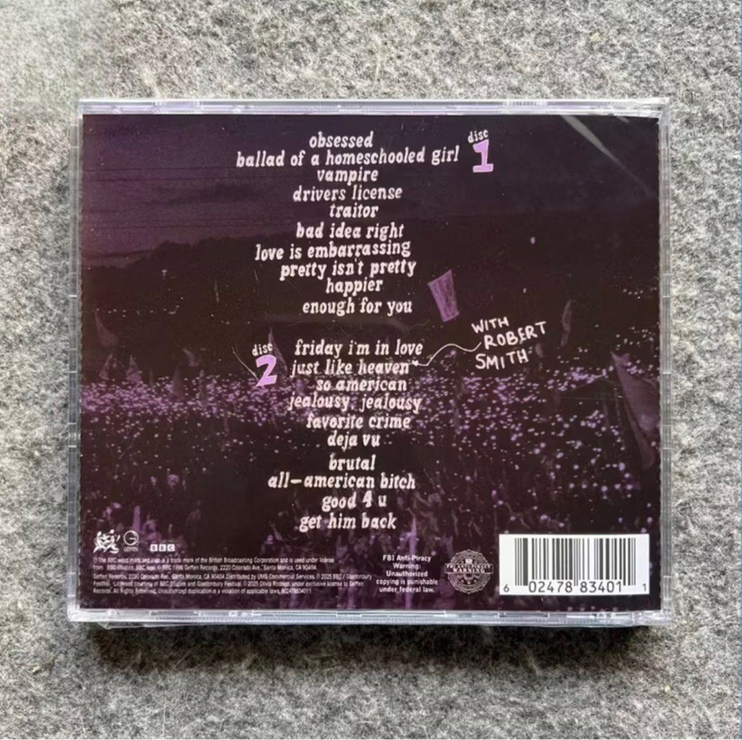 Olivia Rodrigo Live From Glastonbury CD (Category: CDs & DVDs) located in Dasmarinas. Submitted by ohsnaprecords (Listing ID 1423282825, Image 2). Description: CD of Olivia Rodrigo's "Live From Glastonbury" performance. It includes two discs with songs like "drivers license", "vampire", and "good 4 u". The CD features a collaboration with Robert Smith. The album cover is purple with a picture of Olivia Rodrigo. Mode of Payment: Gcash/Paypal Mode 