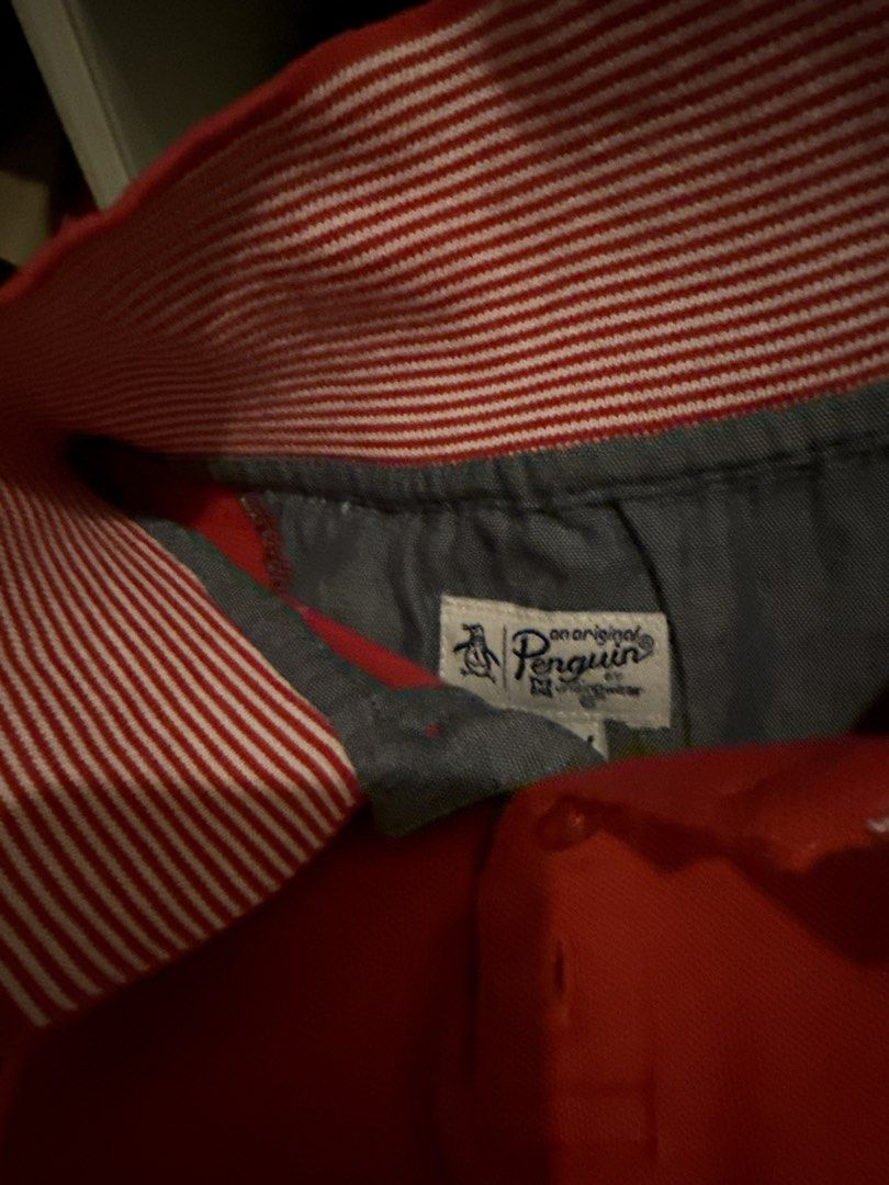 Original Penguin Red Polo Shirt (Category: Tshirts & Polo Shirts ) located in Talisay. Submitted by secondsbyvan (Listing ID 1423385463, Image 3). Description: Original Penguin polo shirt in red with a unique star-patterned collar. Features a classic three-button placket and the iconic Penguin logo on the chest. The collar lining has red and white stripes..