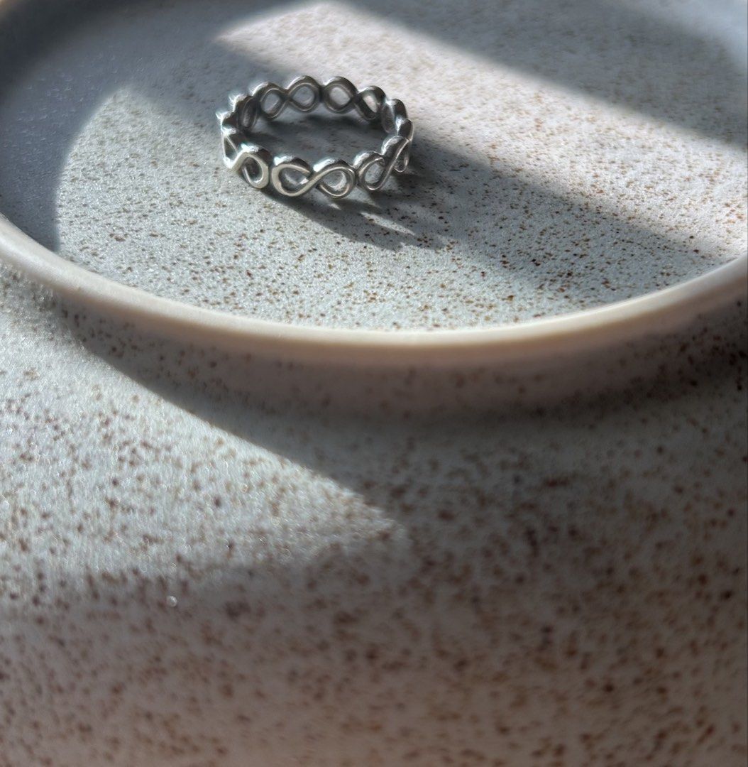 Pandora 925 Silver Infinity Ring 6 (Category: Rings) located in Paranaque City. Submitted by meowlingpersian (Listing ID 1423434608, Image 1). Description: Pandora 925 Silver Infinity Band Size 6 or 52 (based on the standard *global* chart) Purchased in 2018 in Pandora Trinoma May be brought to any Pandora shop for cleaning, or a silver cleaning agent may be used. No more box, shopping bag nor catalogue. P700 Gcash only For pick up only, via LLM 