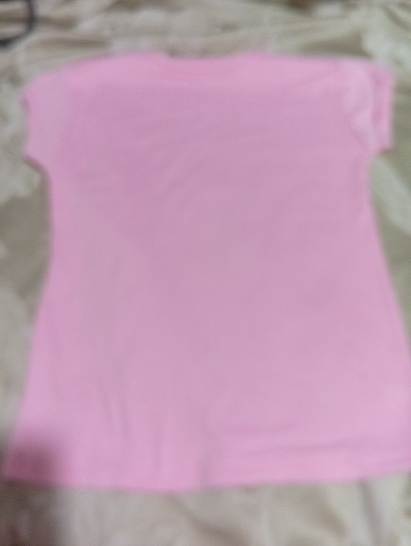 Pink and White T-shirt (Category: Tshirts & Polo Shirts ) located in Manila. Submitted by kaye18bee (Listing ID 1423290652, Image 1). Description: - Pink front, white back - Short sleeves - Round neckline - Lightweight fabric - Ideal for warm weather - Versatile and easy to pair.