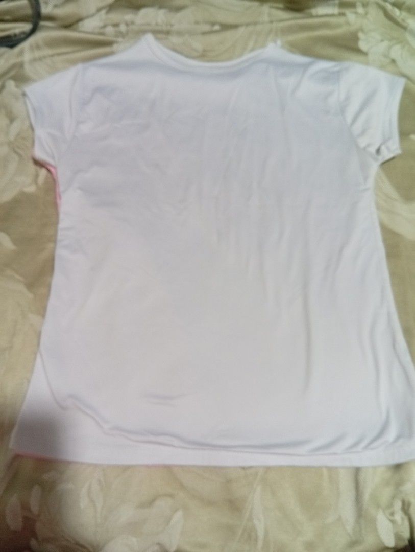 Pink and White T-shirt (Category: Tshirts & Polo Shirts ) located in Manila. Submitted by kaye18bee (Listing ID 1423290652, Image 2). Description: - Pink front, white back - Short sleeves - Round neckline - Lightweight fabric - Ideal for warm weather - Versatile and easy to pair.