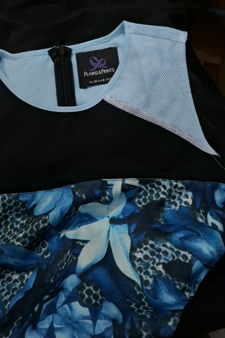 Plains & Prints Sleeveless Dress (Category: Dresses) located in Quezon City. Submitted by MP_Declutters (Listing ID 1423328977, Image 2). Description: ✨ Plains & Prints Sleeveless Dress ✨ Elegant sleeveless dress from Plains & Prints featuring a flattering silhouette with vibrant blue floral print details. ✔ Preloved ✔ Lightly used ✔ Good condition ✔ No major flaws or damage ✔ Comfortable and classy fit ✔ Perfect for office wear, casual chic outf