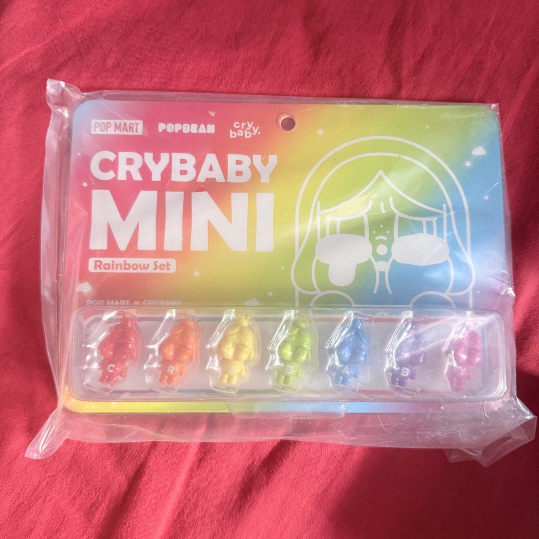 Pop Mart Crybaby Mini Rainbow Set (Category: Designer & Blind Box Toys) located in Binan City. Submitted by woniebleps (Listing ID 1423310772, Image 1). Description: - Pop Mart Crybaby Mini Rainbow Set - Includes six unique, colorful Crybaby figures - Each figure is individually packaged - Original packaging is sealed (new and unopened) - Perfect for collectors or gifting.