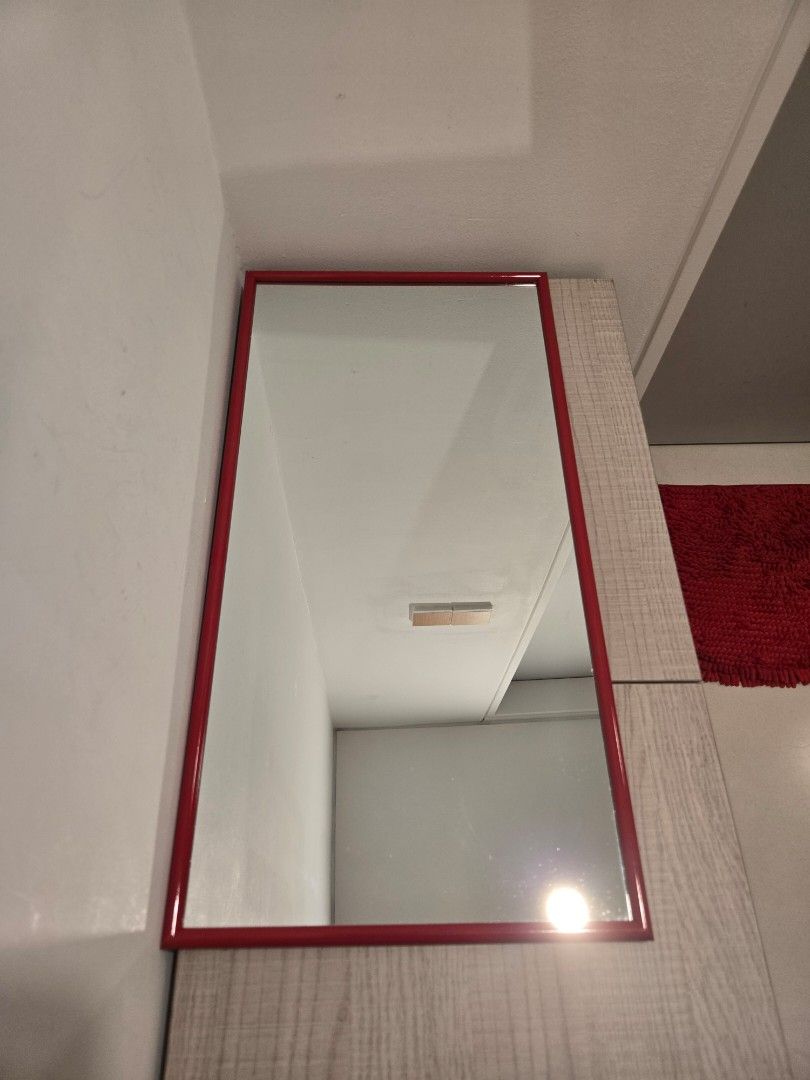 Red Framed Rectangular Mirror (Category: Mirrors) located in Kuala Lumpur. Submitted by kryptonite_love (Listing ID 1423386366, Image 1). Description: Rectangular mirror with a red frame. It is suitable for various spaces, such as a bathroom or bedroom. The frame is a vibrant red, adding a pop of color to any room. The mirror is ready to be mounted. 63cm x 32.5cm.