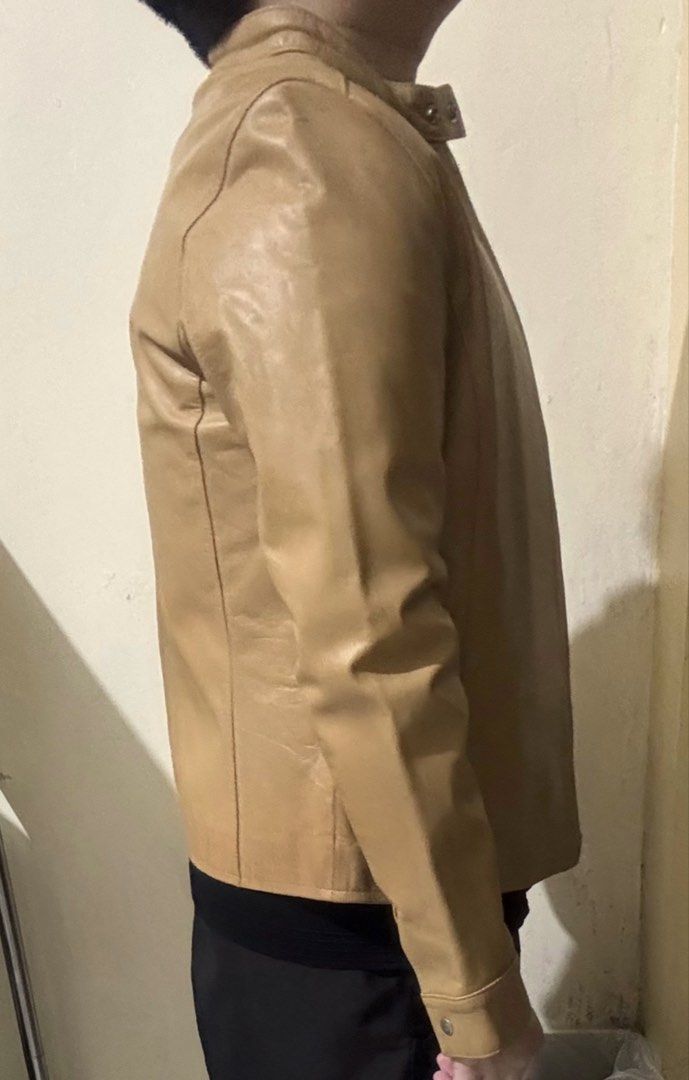 (S) Men's Tan Real Leather Jacket (Category: Coats, Jackets and Outerwear) located in Baguio. Submitted by db_clothing (Listing ID 1415598995, Image 2). Description: Real Leather Dimensions: Width: 19 inches Length: 23 inches Shoulder: 16 inches Sleeve: 23 inches.