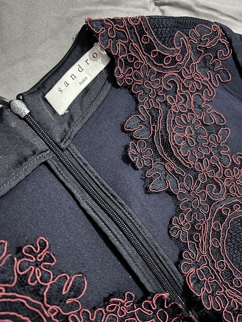 Sandro Paris Navy Blue Embroidered Dress (Category: Dresses) located in Muntinlupa City. Submitted by beeminees (Listing ID 1423269059, Image 3). Description: - Sandro Paris navy blue dress - Intricate embroidery on bodice - Flattering silhouette - Can fit Small - Medium - Zipper closure - Perfect for special occasions and sophisticated looks.