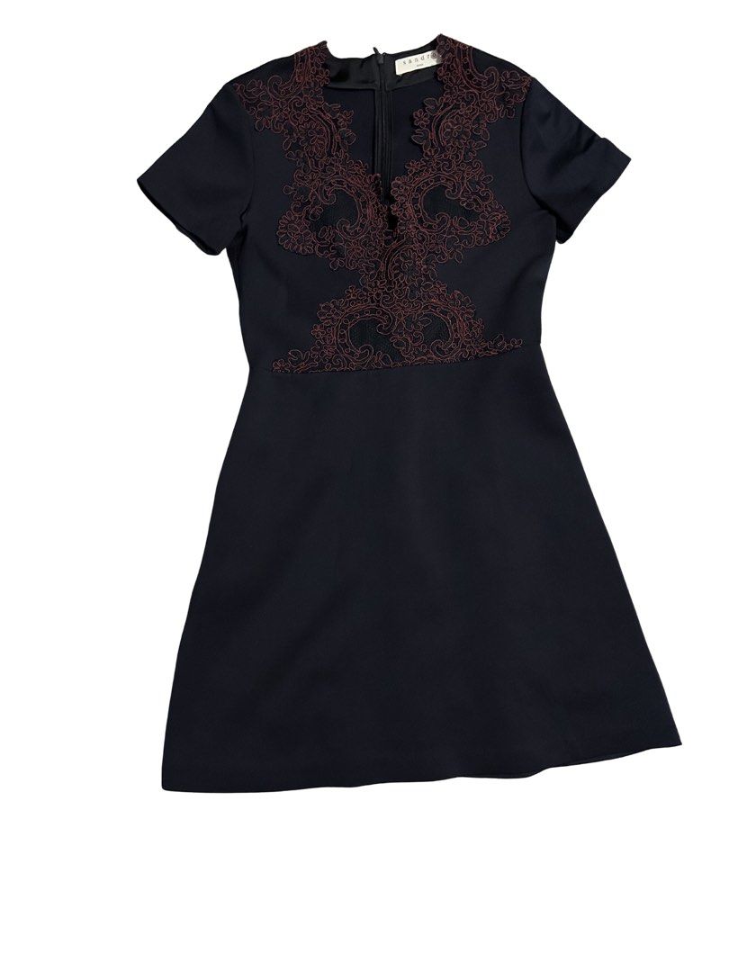 Sandro Paris Navy Blue Embroidered Dress (Category: Dresses) located in Muntinlupa City. Submitted by beeminees (Listing ID 1423269059, Image 2). Description: - Sandro Paris navy blue dress - Intricate embroidery on bodice - Flattering silhouette - Can fit Small - Medium - Zipper closure - Perfect for special occasions and sophisticated looks.