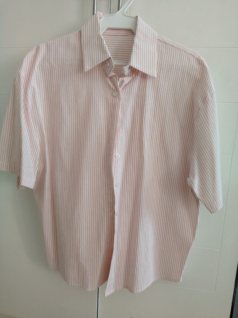 Shein top (Category: Blouses) located in Mandaluyong City. Submitted by pinkcel (Listing ID 1423311387, Image 1). Description: Pink Stripe polo shirt Unused but washed already Sf shouldered by the buyer.