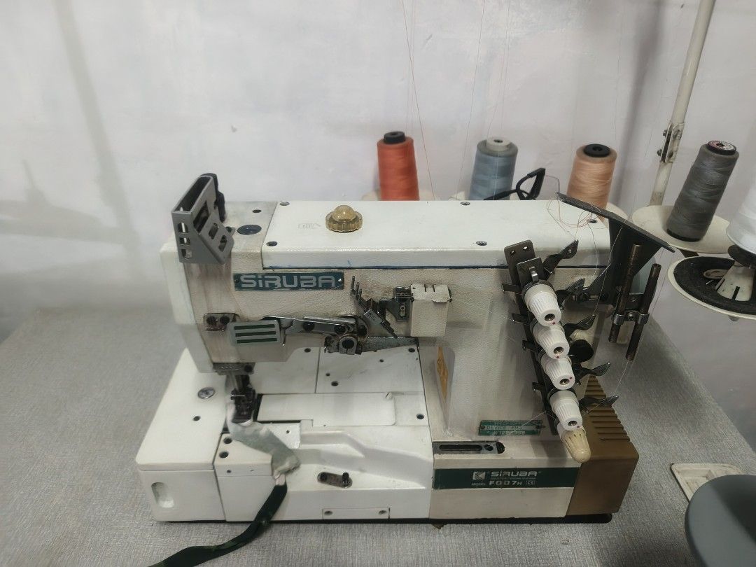 Siruba F007W Overlock Sewing Machine (Category: Craft Supplies & Tools) located in Manila. Submitted by keopiko (Listing ID 1423414115, Image 2). Description: - Siruba F007W overlock sewing machine flat bed Features multiple thread spools Built-in cutting mechanism 3mos warranty Running condition Ready to use 2nd hand New table Message for inquiries Pm there's other Units available.
