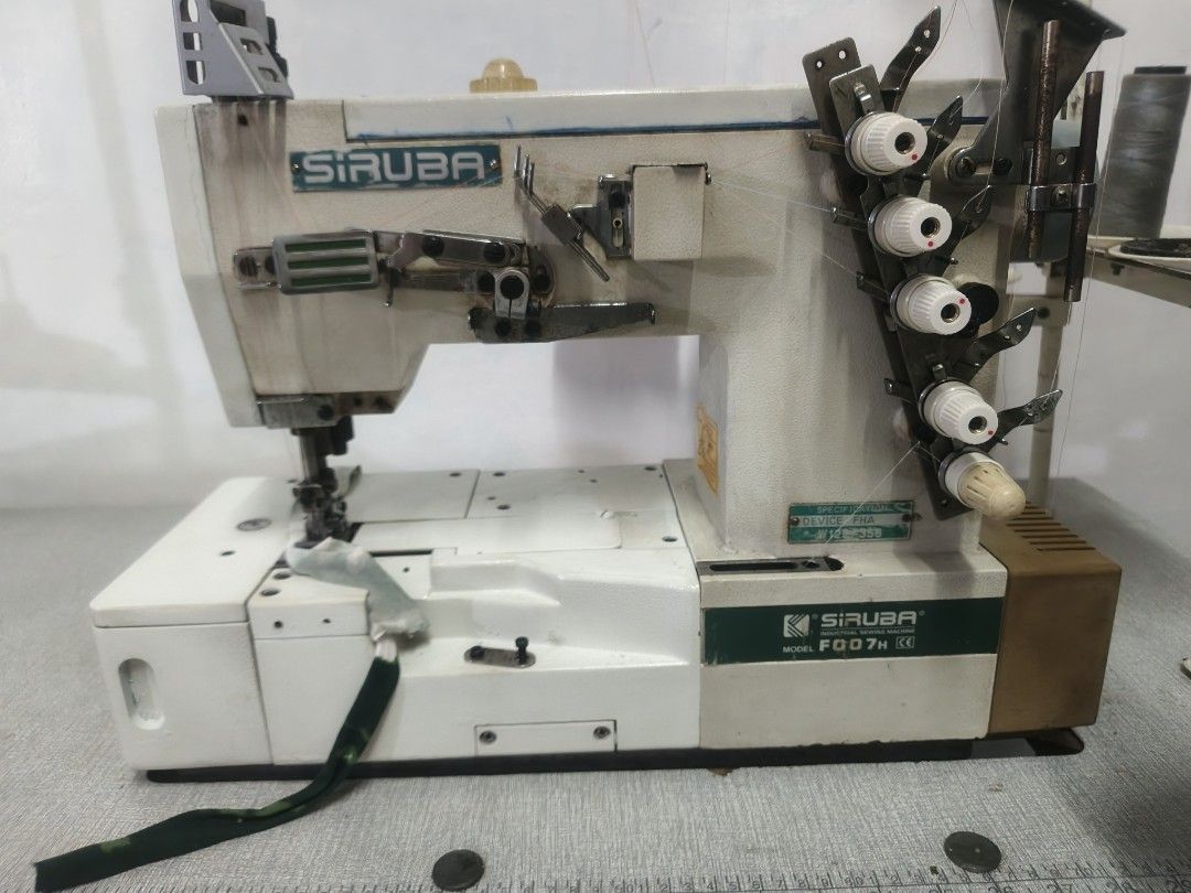 Siruba F007W Overlock Sewing Machine (Category: Craft Supplies & Tools) located in Manila. Submitted by keopiko (Listing ID 1423414115, Image 1). Description: - Siruba F007W overlock sewing machine flat bed Features multiple thread spools Built-in cutting mechanism 3mos warranty Running condition Ready to use 2nd hand New table Message for inquiries Pm there's other Units available.