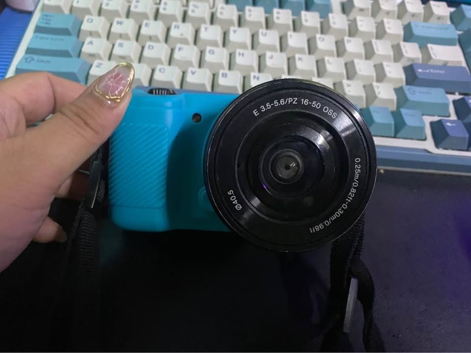 Sony Alpha A5000 Mirrorless Camera + Lens | Perfect for Vlogging & Beginners (Category: Cameras) located in Kawit. Submitted by mhai0913 (Listing ID 1423332750, Image 3). Description: Location: Kawit, Cavite Price: P19,999 (negotiable) Sony A5000 Mirrorless Camera in very good condition — fully working, well taken care of, and ready to use. Perfect for Vlogging & Beginners Minor scratches. Ginagamit lng pag may occassion. 📸 Key Features: 20.1MP 