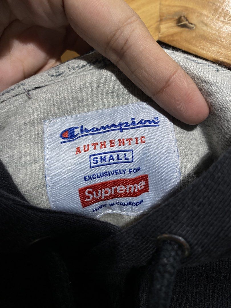 Supreme x Champion Hoodie (Category: Hoodies) located in Tagbilaran City. Submitted by revampedthrift (Listing ID 1423303561, Image 2). Description: Supreme x Champion Width x Length: 21x25.5 Very Good Condition Color rate: 8.9/10 Issue: Sunfade sa sleeve .