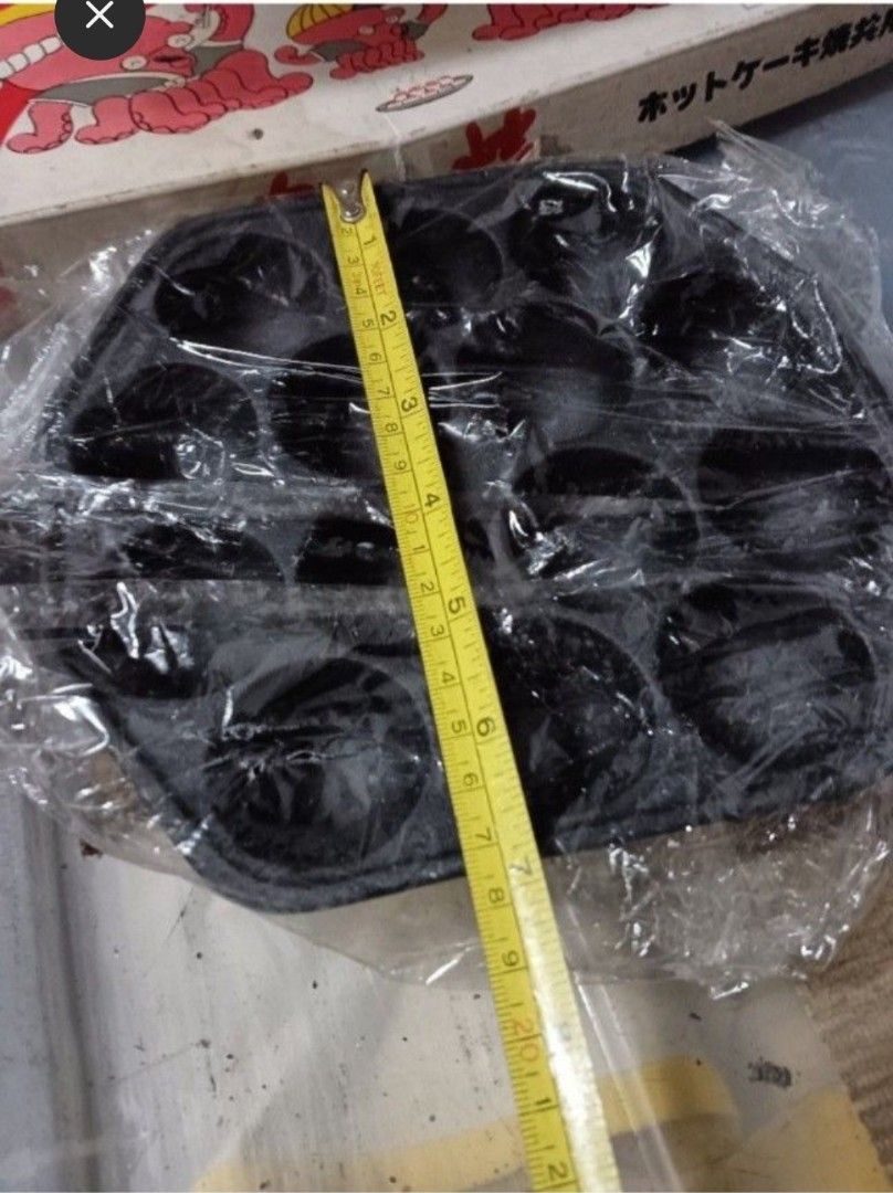 Takoyaki Pan cast iron japan (Category: Cookware & Accessories) located in Caloocan City. Submitted by toys_r_here (Listing ID 1423368464, Image 2). Description: - Brand new Takoyaki pan from Tako-Do. - Features 14 circular molds. - Unused and in original packaging. - Box includes images of cooked takoyaki. - Ideal for making delicious takoyaki at home..