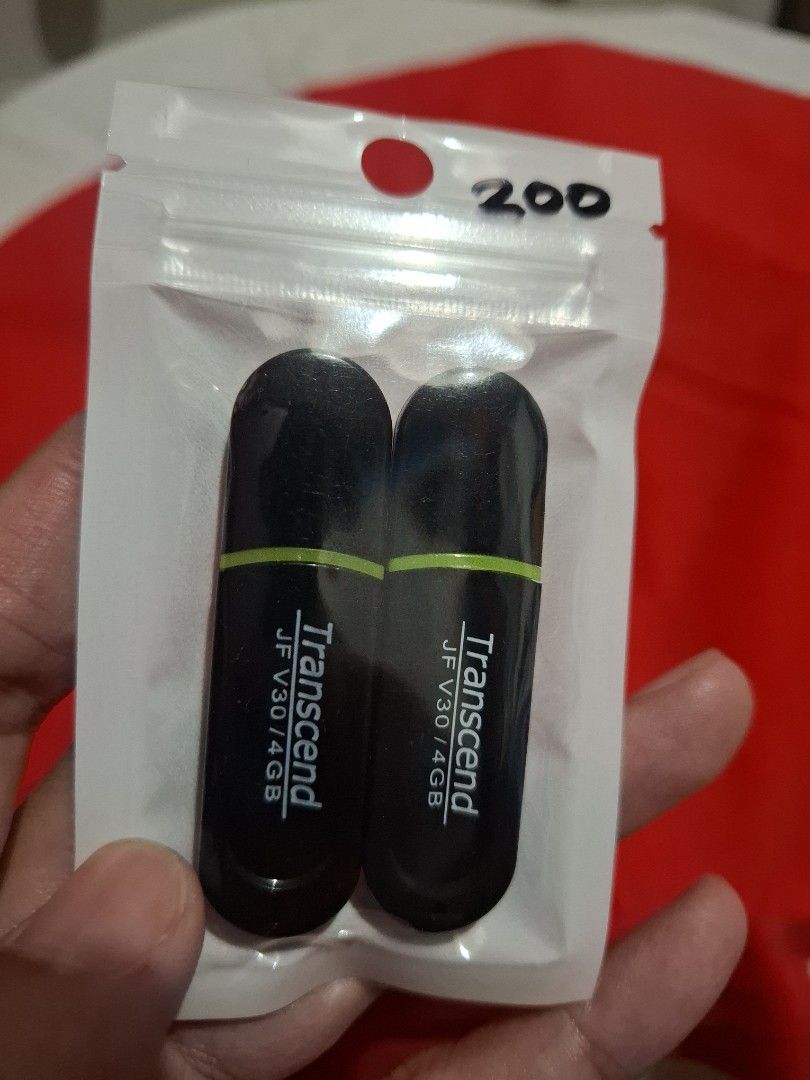 Transcend JF V30 4GB USB Flash Drive (Category: Hard Disks & Thumbdrives) located in Las Pinas. Submitted by All.here_OnlineShop (Listing ID 1423265363, Image 2). Description: Transcend 2 pcs of JF V30 4GB USB used Flash Drive. Black with green stripe. Ready to use. ₱200 only..