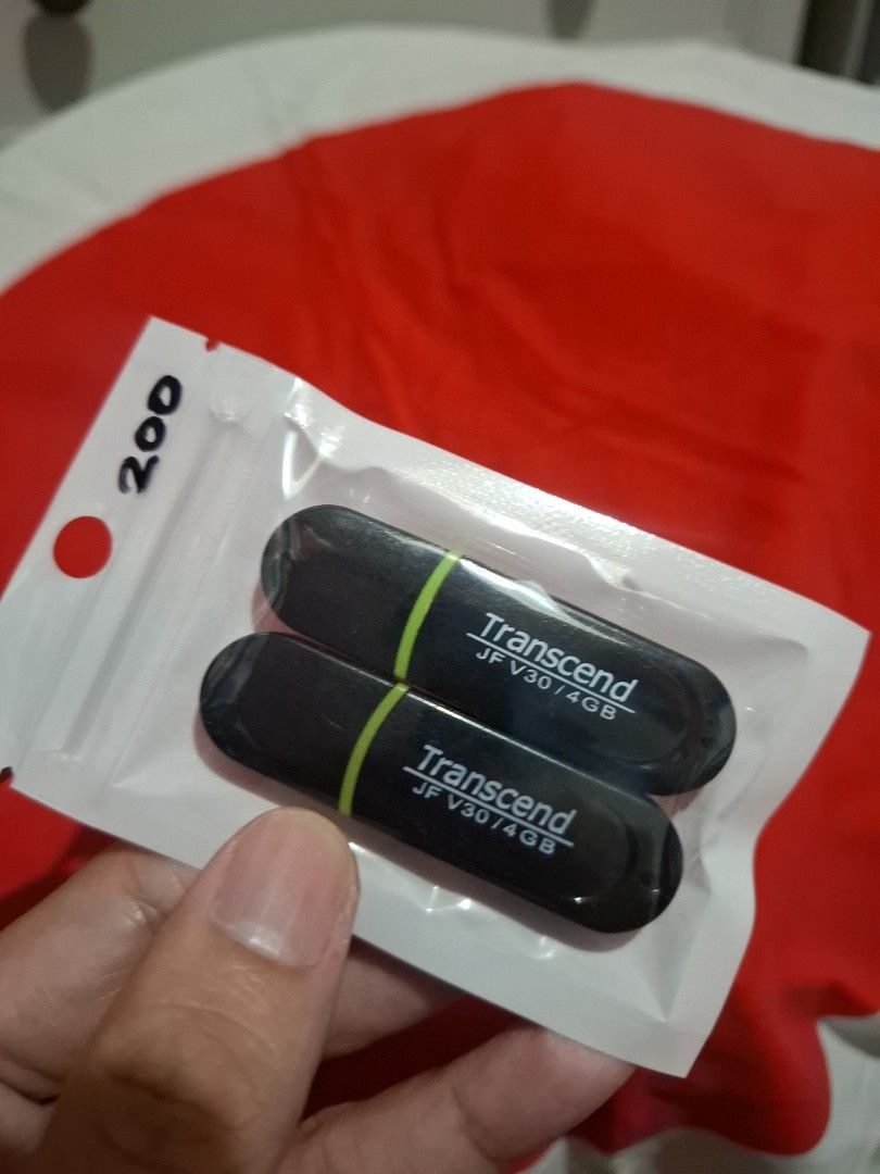 Transcend JF V30 4GB USB Flash Drive (Category: Hard Disks & Thumbdrives) located in Las Pinas. Submitted by All.here_OnlineShop (Listing ID 1423265363, Image 1). Description: Transcend 2 pcs of JF V30 4GB USB used Flash Drive. Black with green stripe. Ready to use. ₱200 only..