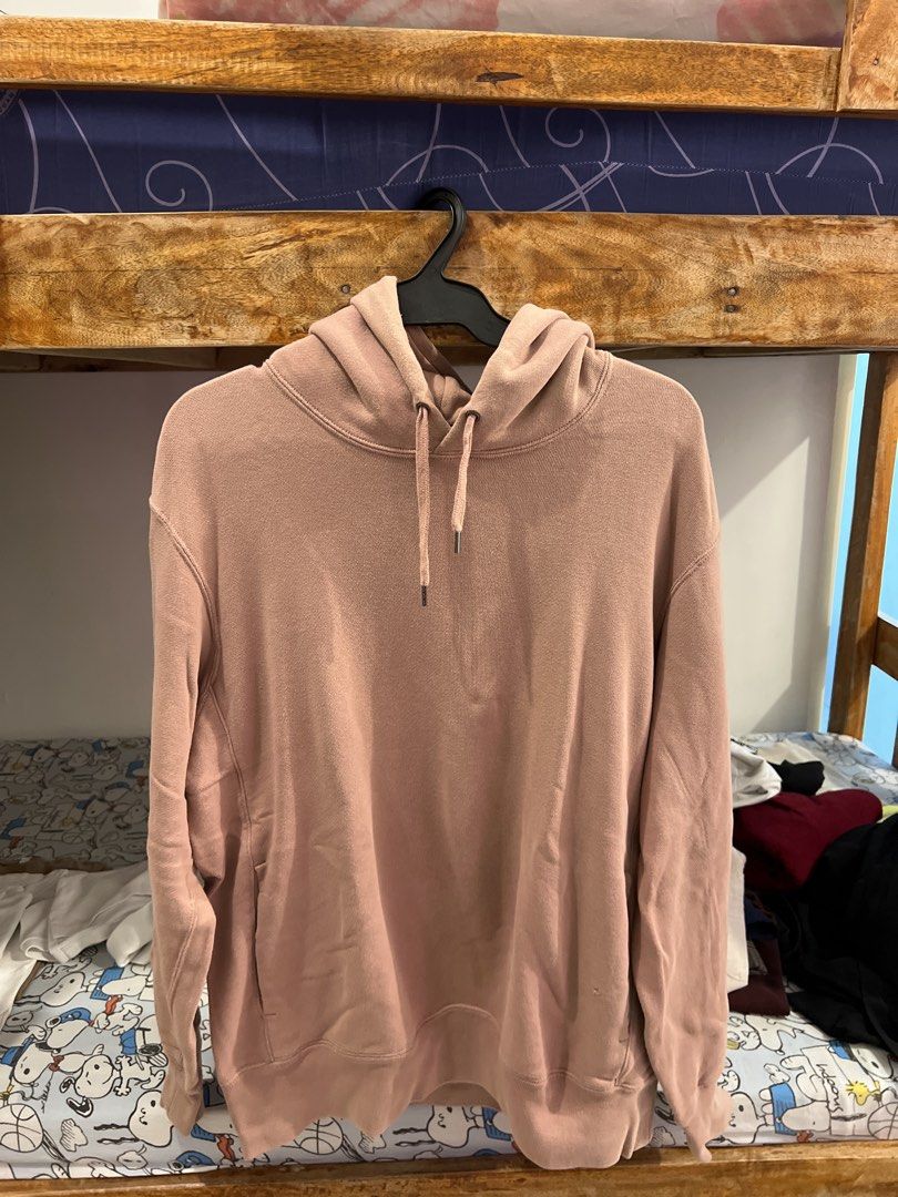 Uniqlo Hoodie - XL (Category: Hoodies) located in Baguio. Submitted by rhyac (Listing ID 1423302721, Image 1). Description: - Uniqlo hoodie in light pink - Size: XL - Features: Drawstring hood, kangaroo pocket - Made in Vietnam - Soft and comfortable material - Versatile for various outfits.