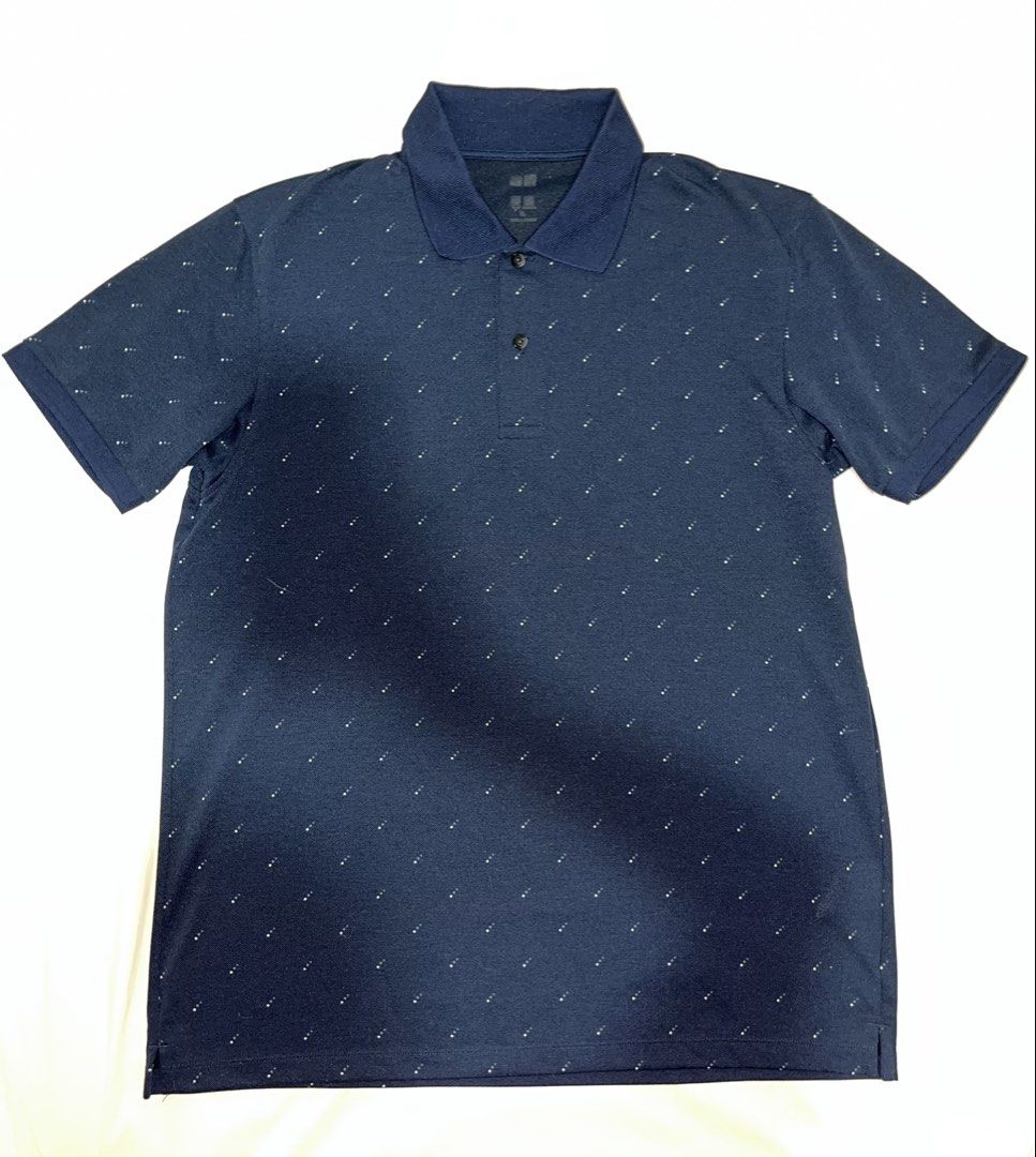 Uniqlo Polo Shirt (Category: Tshirts & Polo Shirts ) located in Taguig. Submitted by vnce. (Listing ID 1423360078, Image 1). Description: Rfs: Decluttering Details are in the photos. AOP (All-Over Print) Size XL, fits M to L Colors may vary due to lighting. (Navy Blue) MOP: Maya & BPI +sf Negotiable Dimes: - Width - 23 - Length - 28.5 - Sleeve - 8.5.