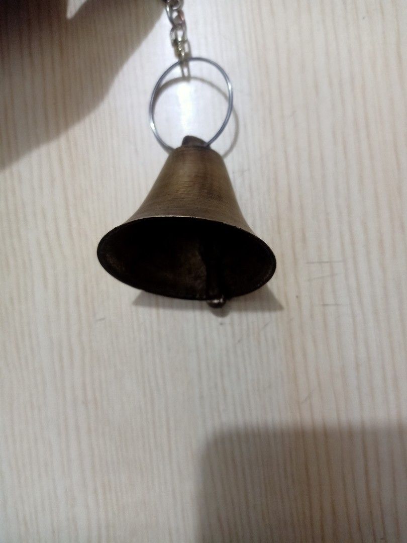 Vintage Brass Bell with Ring (Category: Vintage Collectibles) located in Las Pinas. Submitted by the_recycle_shop (Listing ID 1423397312, Image 2). Description: - Vintage brass bell - Classic bell shape with flared bottom - Tarnished finish - Includes clapper - Ring attached for hanging or carrying.