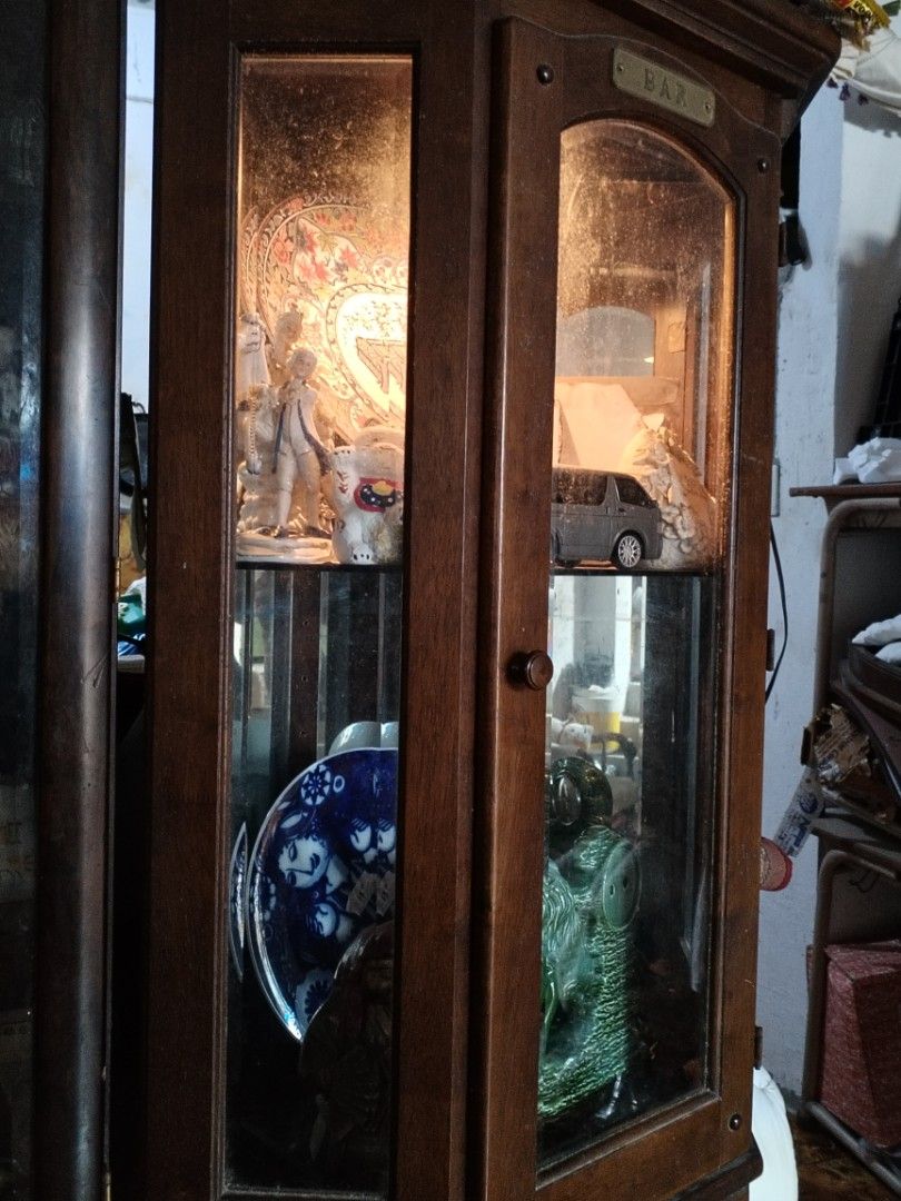 Vintage Wooden Display Cabinet (Category: Shelves, Cabinets & Racks) located in Caloocan City. Submitted by rowely_jpn (Listing ID 1423303496, Image 3). Description: - Vintage display cabinet - Classic design with glass panels - Multiple shelves for display - Ideal for collectibles and figurines - Made of wood - Adds a warm touch to any room.