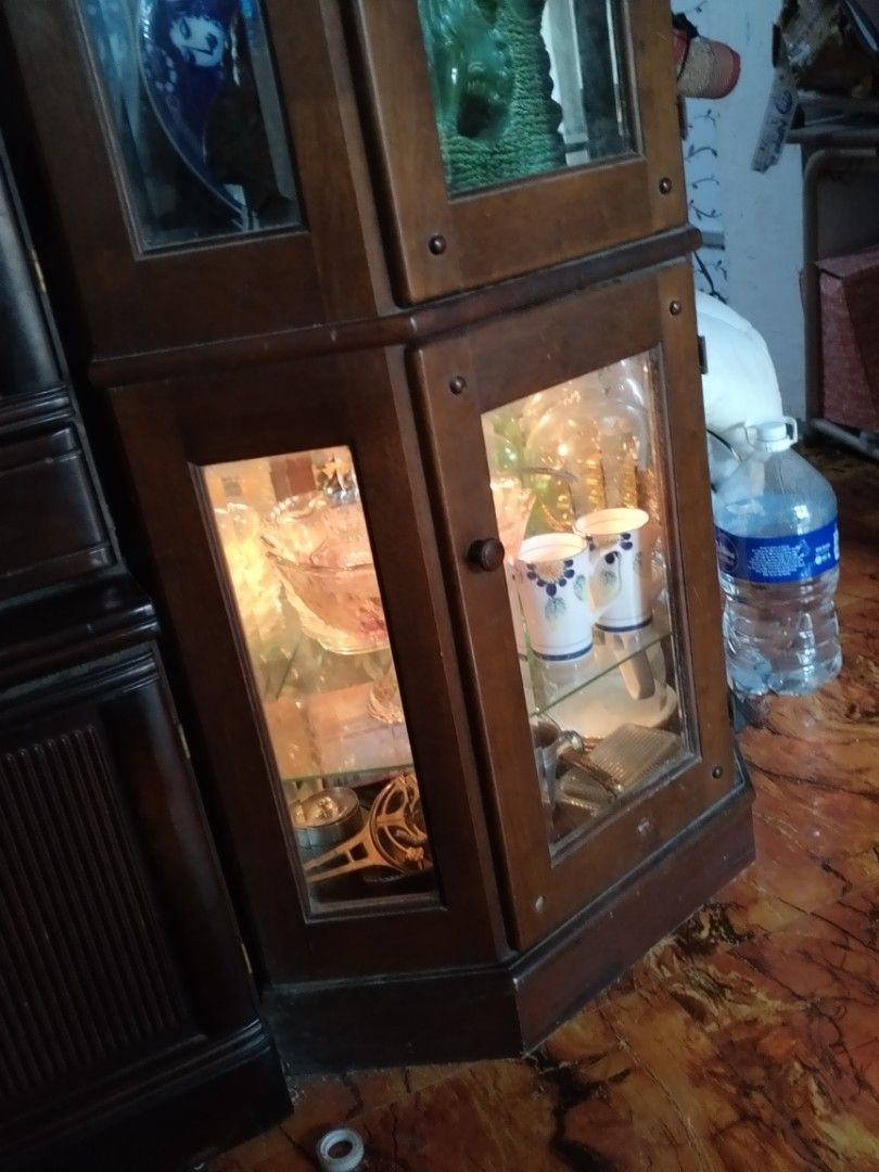 Vintage Wooden Display Cabinet (Category: Shelves, Cabinets & Racks) located in Caloocan City. Submitted by rowely_jpn (Listing ID 1423303496, Image 2). Description: - Vintage display cabinet - Classic design with glass panels - Multiple shelves for display - Ideal for collectibles and figurines - Made of wood - Adds a warm touch to any room.