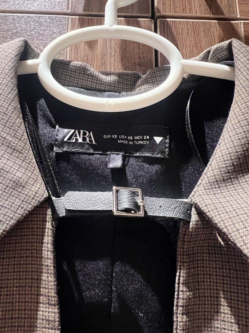 Zara Mini Dress - XS (Category: Dresses) located in Quezon City. Submitted by _dolfin (Listing ID 1423355876, Image 3). Description: - Zara mini dress - Color: Plaid Brown - Size: XS - Minor defects: stitching at the front & leather detail but can be easily fixed .