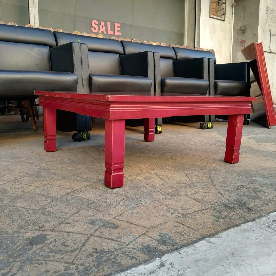 2nd hand Square Wooden Coffee Table | Foldable Legs (Category: Tables & Sets) located in Paranaque City. Submitted by 2ndcharmfurniture (Listing ID 1423525518, Image 2). Description: Square wooden coffee table with a rich red finish. The table has a classic design with a sturdy base. Dimensions are L80cm x W80cm x H33cm. Perfect for living rooms or lounges. A practical and stylish addition to any space..