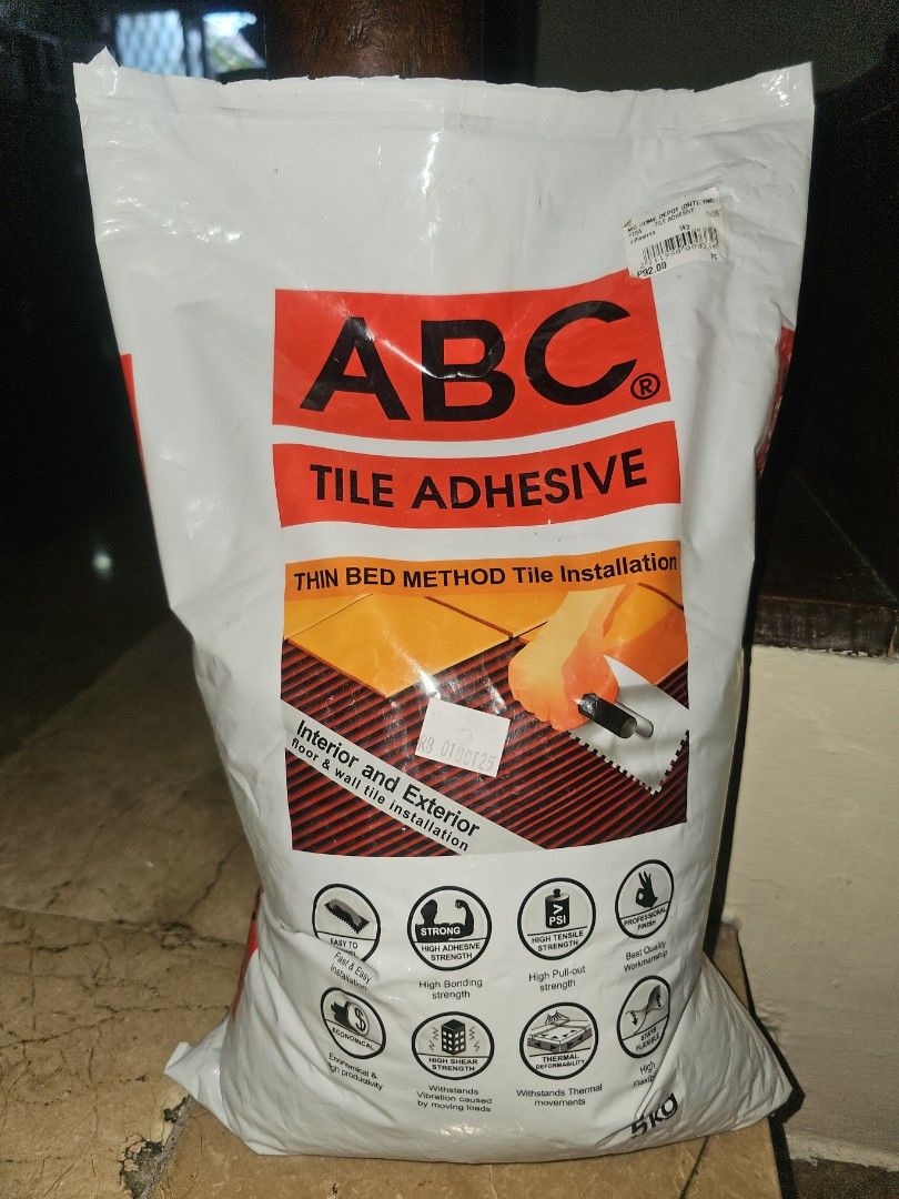 ABC Tile Adhesive (Category: Construction & Building Materials) located in Manila. Submitted by blingers (Listing ID 1423454585, Image 2). Description: -5 kg ABC Tile Adhesive for thin bed tile installation. - Suitable for both interior and exterior use. - Easy tile installation. - Comes in a white bag with red and black text..