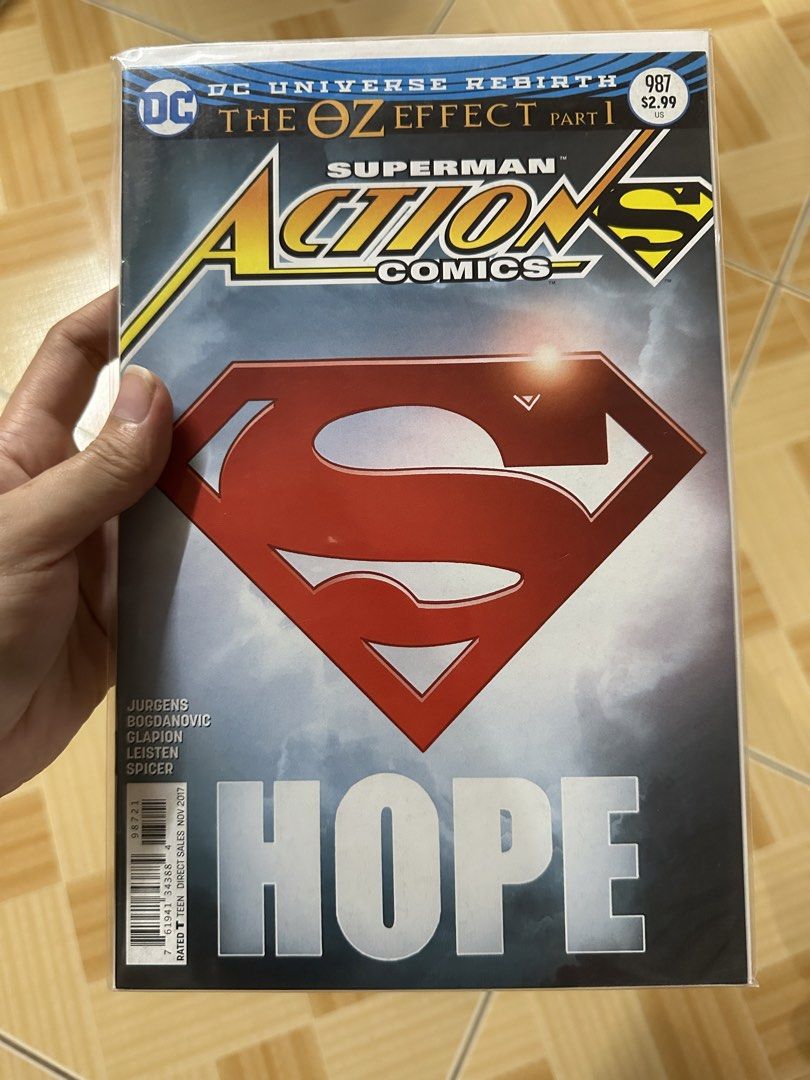 Action Comics #987 Superman (Category: Comics & Manga) located in Binan City. Submitted by elf.0000 (Listing ID 1423560840, Image 1). Description: Action Comics #987 featuring Superman. Part 1 of The Oz Effect. Published by DC Comics. Features the Superman logo prominently. Includes the names of the creators: Jurgens, Bogdanovic, Glapion, Leisten, and Spicer. P150.00 plus sf In very good condition Payment via gcash Ship thru j&t.