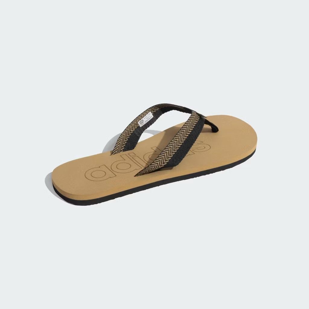 Adidas Mistico Flip Flops (Category: Slippers and slides) located in Manila. Submitted by jayveecatu14021 (Listing ID 1423557804, Image 2). Description: - Adidas Mistico flip flops - Tan and black colorway - Adidas logo on footbed - Textured sole for grip - Patterned straps - Comfortable for everyday wear - Stylish design.