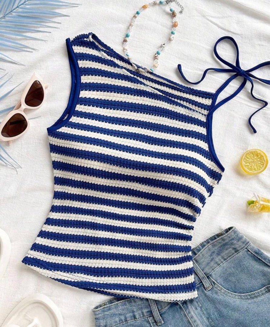 Asymmetrical ruched top (Category: Sleeveless) located in Pasig City. Submitted by ____andd (Listing ID 1423473614, Image 1). Description: old acc with 100+ reviews got hacked. - xs on tag but can fit up to large frames. Ruched and stretchy.