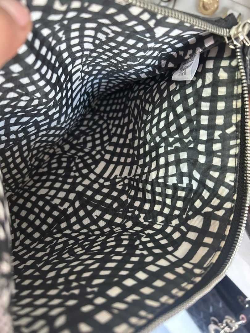 Authentic MCM Black Big Pouch Clutch Wristlet (Category: Luxury Bags & Wallets) located in Quezon City. Submitted by lexi.cloud (Listing ID 1423496362, Image 2). Description: ⚜️ guaranteed authentic ⚜️ 10/10 condition ⚜️ no flaws, no signs of usage ⚜️ preloved ⚜️ no inclusions money back guaranteed if proven fake. pm for sure buyers only..