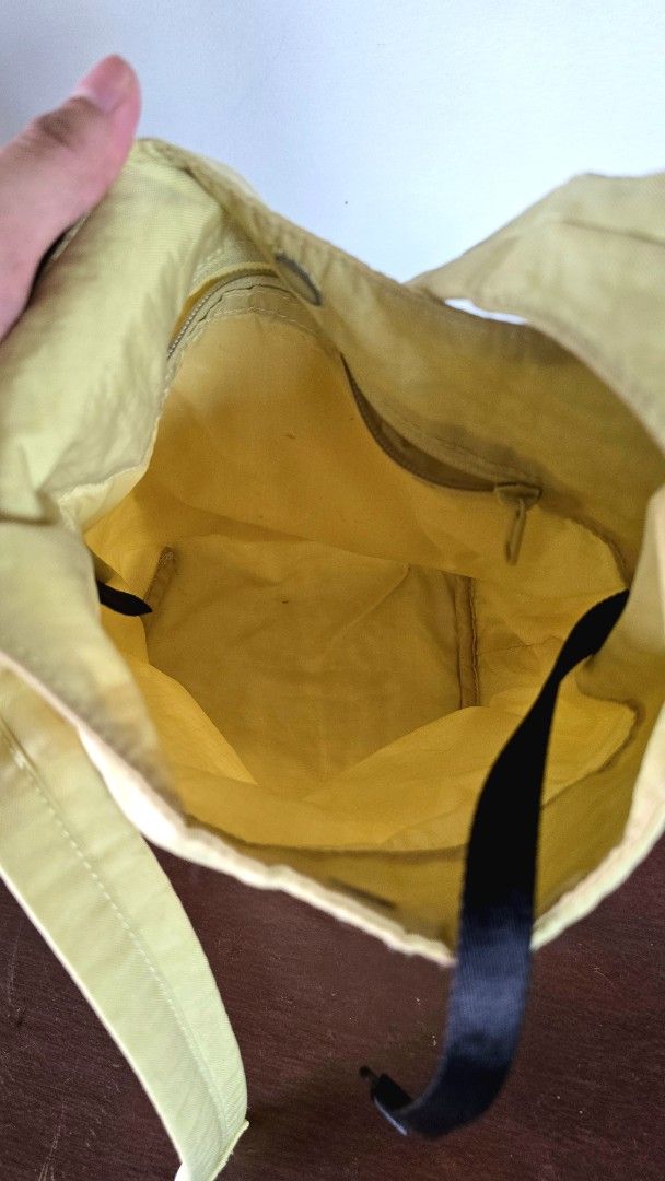 Baggu Small Nylon Sling - Butter (Category: Shoulder Bags) located in Malolos. Submitted by ciantin (Listing ID 1423484197, Image 3). Description: - Authentic. Bought from Certified Calm. - Used only a few times but with flaws: small lipstick stains inside (see pics).