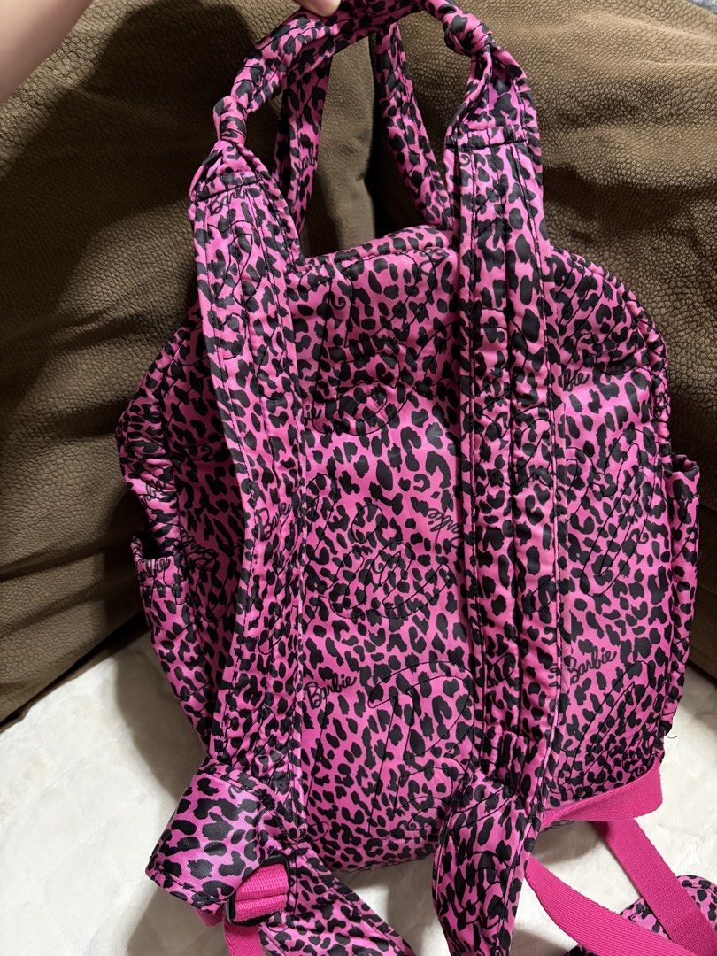 Barbie Pink Leopard Print Backpack (Category: Backpacks) located in Cagayan de Oro. Submitted by secondchances.x (Listing ID 1423541308, Image 2). Description: - Barbie Pink Leopard Print Backpack - Features a fun pink leopard print design - Genuine Barbie product - Perfect for school or everyday use - Stylish and eye-catching.