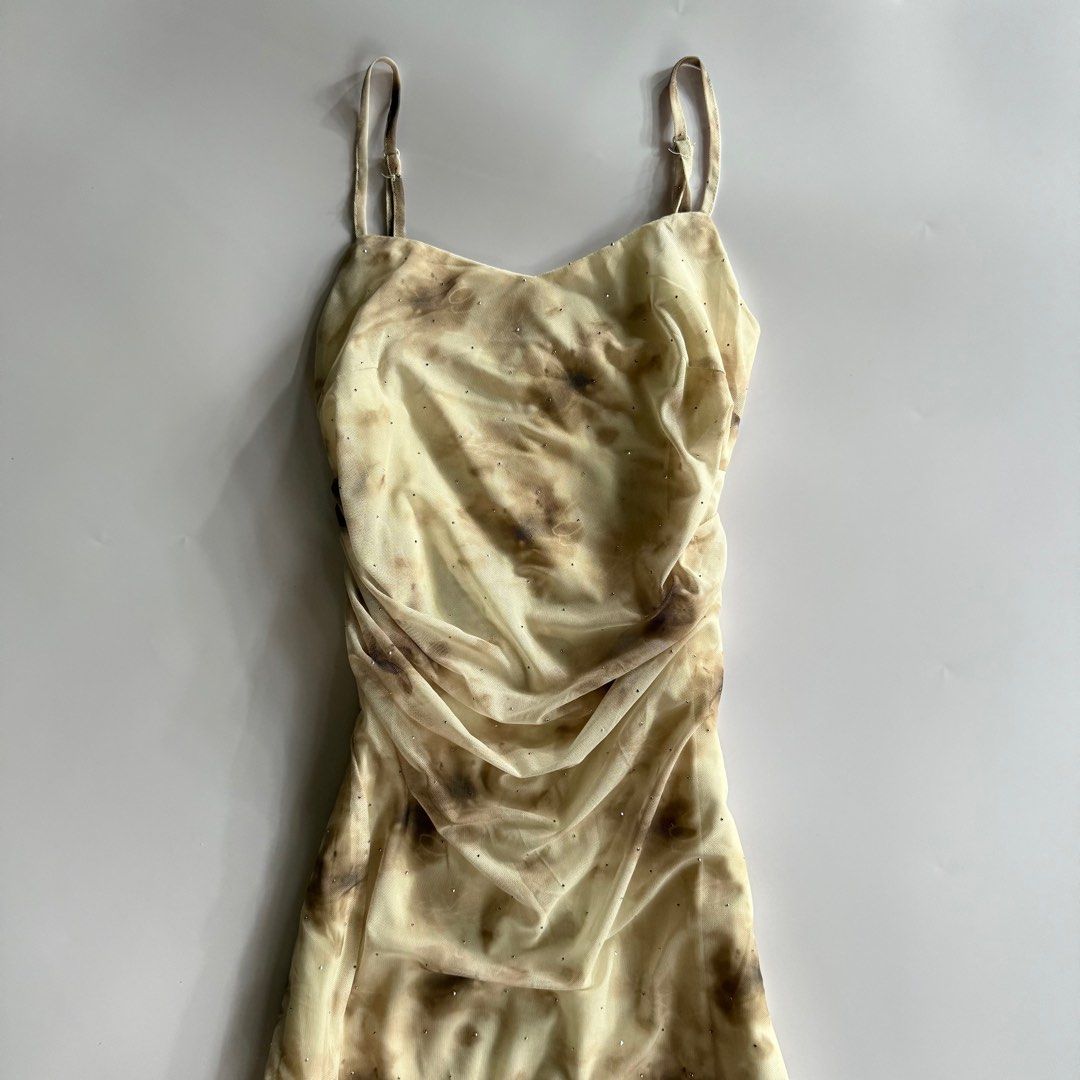 Beautiful Glitter Mesh Ruched Dress (Category: Dresses) located in Iloilo. Submitted by notriaaa (Listing ID 1423462779, Image 2). Description: -Size: Small-Semi M -Bust: up to 34 -W: up to 27 -L: 49” No flaws.