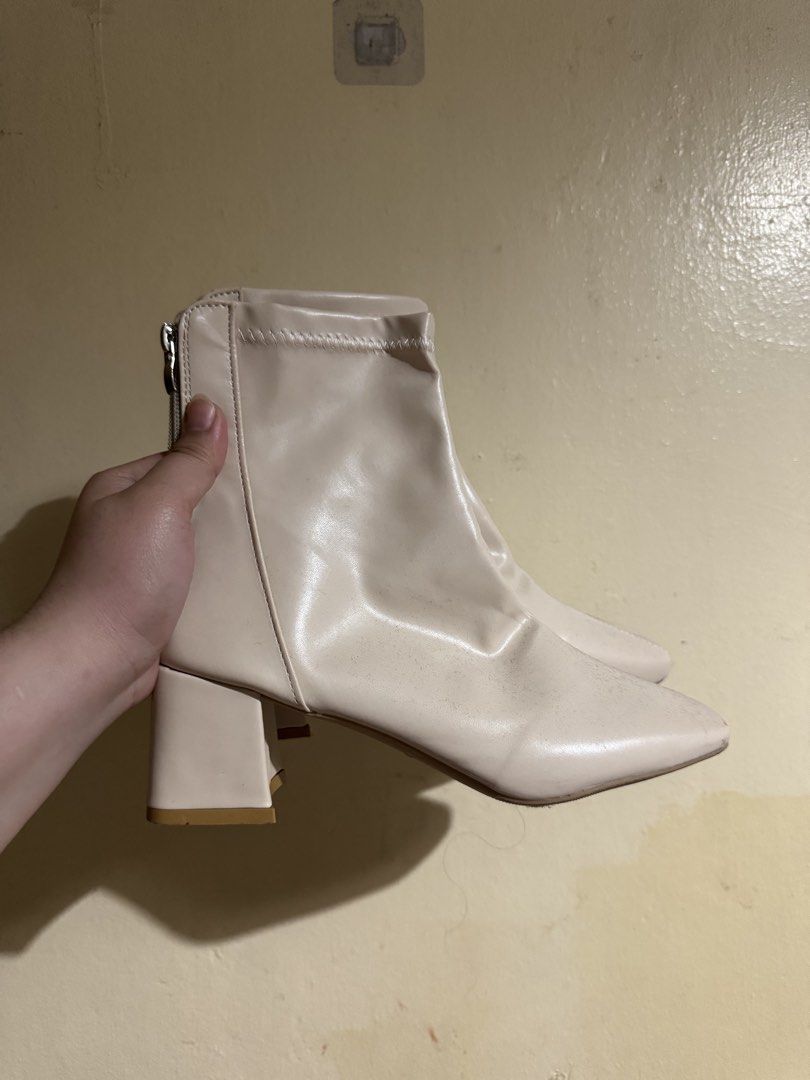 Beige Ankle Boots Size 38 (Category: Boots) located in Manila. Submitted by luisascloset_ (Listing ID 1423498522, Image 1). Description: - Beige ankle boots - Square toe design - Block heel - Back zipper closure - Size 38 - Made in China - Smooth, possibly leather-like upper - Matching beige heels -never used, naiwan ko sa bahay Whahahaha.