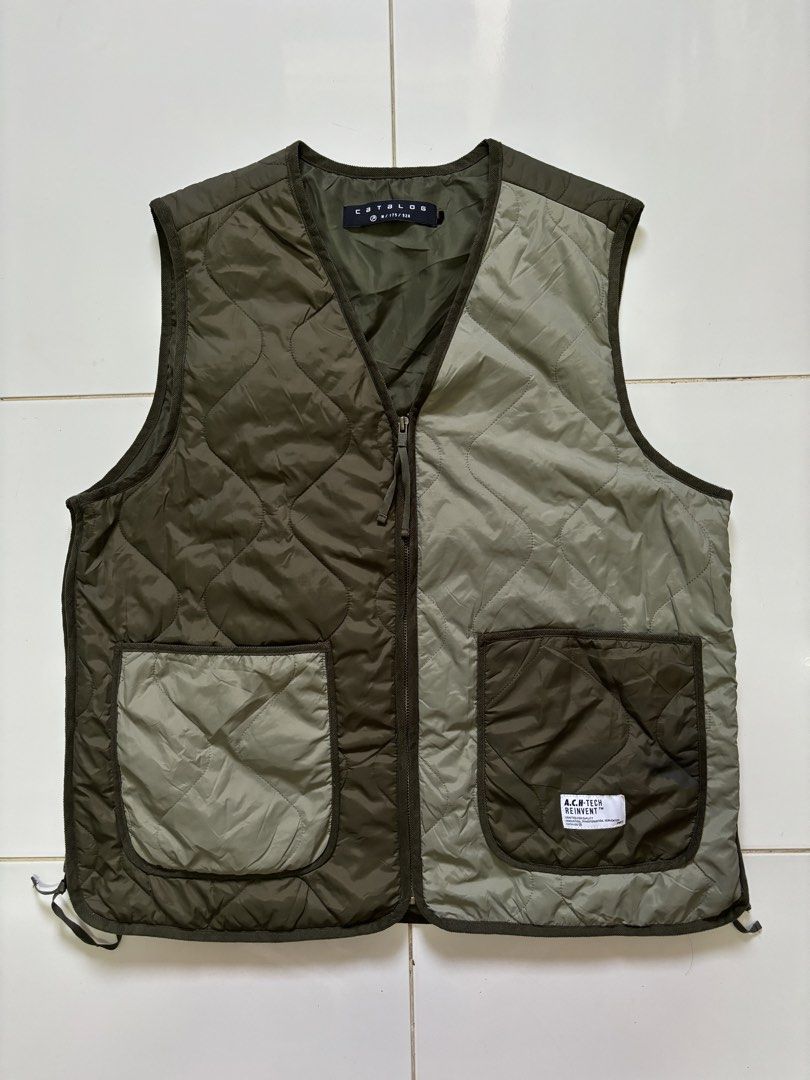 Catalog Quilted Vest (Category: Vests) located in Manila. Submitted by Caps4everyone (Listing ID 1423529676, Image 1). Description: For sale - price 1,200 - Two-tone quilted design - Zip-up front - V-neck - Two front pockets - Size: M / 175 / 92A - Condition: Good Location: caloocan Shipping: lbc and lalamove Pm for sure buyer only.