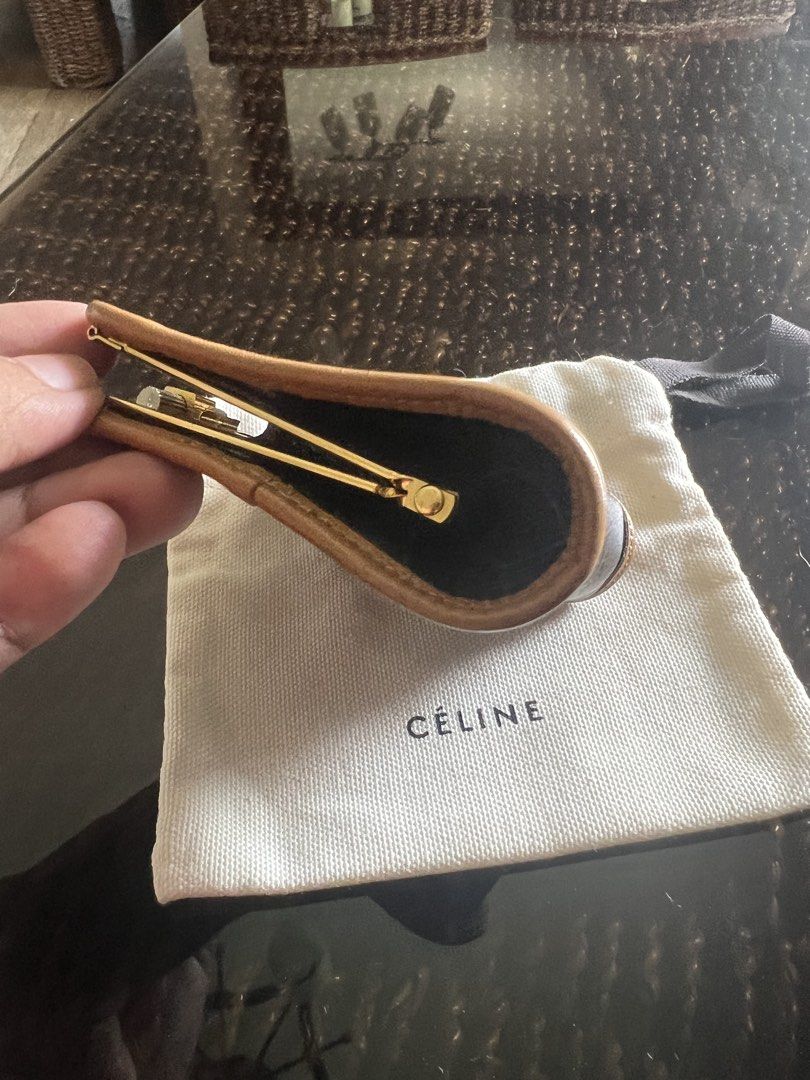Christian Dior Coin Purse (Category: Luxury Bags & Wallets) located in Manila. Submitted by murafinds26 (Listing ID 1423446505, Image 3). Description: Vintage !! - Authentic Christian Dior coin purse - Features a brown and tan exterior - Gold-tone clasp - Solid brown interior - Includes dust bag - Made in France.