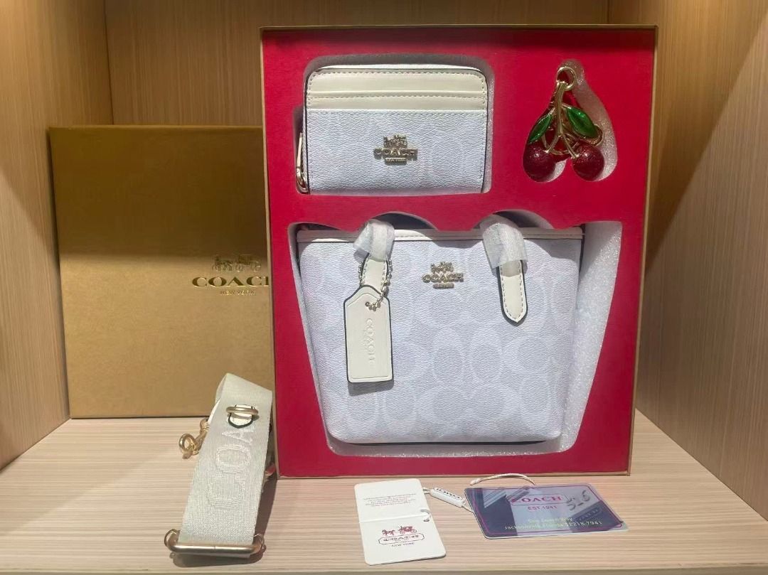 Coach Handbag Set with Wallet and Cherry Charm (Category: Luxury Bags & Wallets) located in Quezon City. Submitted by lux4cheapmnl216 (Listing ID 1423589252, Image 2). Description: Available in different colors, PM me for availability. Transactions done before 3PM can be for same day delivery. Otherwise, next day shipping na po..