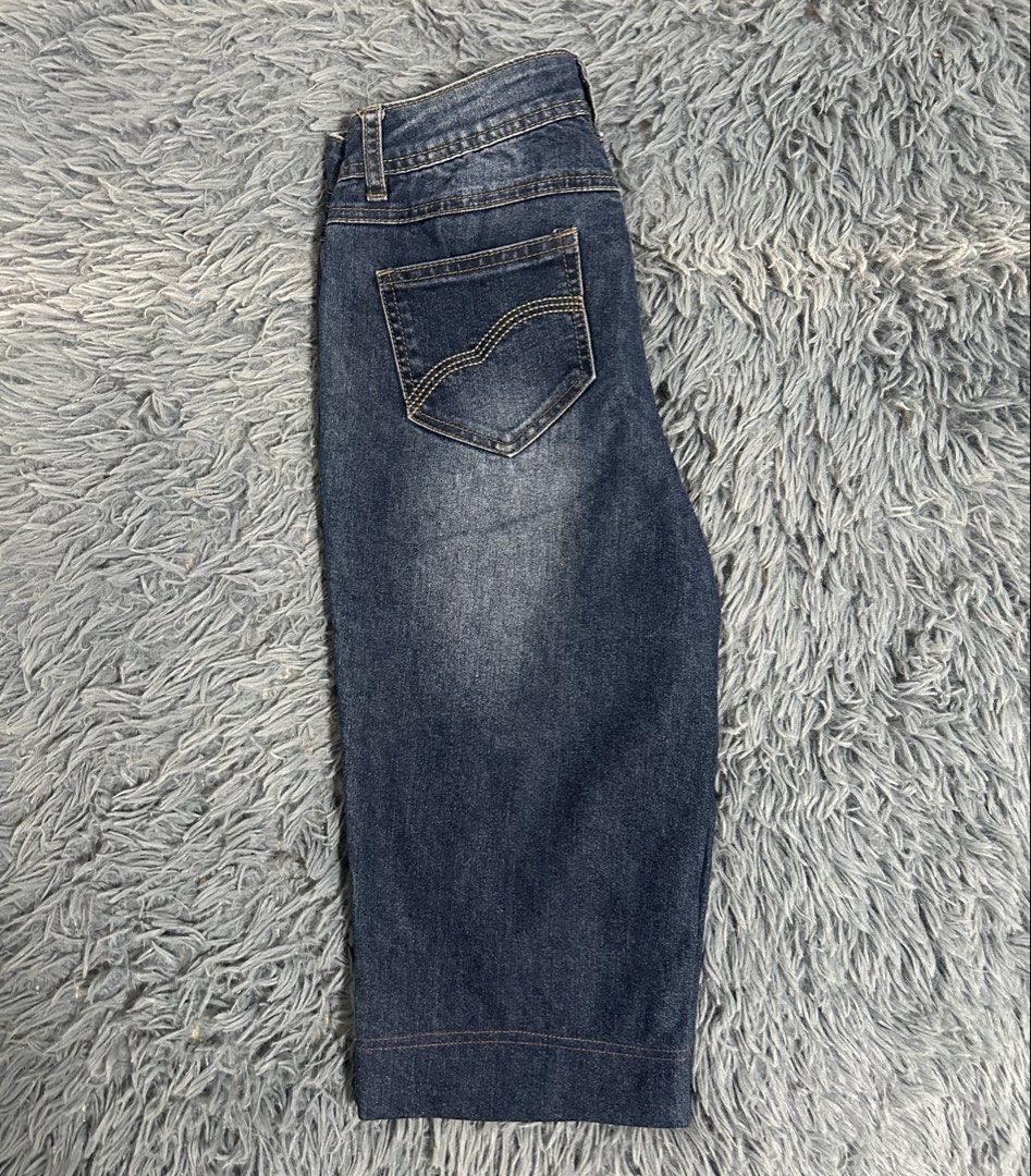Denim Capris Shorts (Category: Shorts) located in San Mateo. Submitted by pionaaa (Listing ID 1423580885, Image 2). Description: - Stylish denim capri shorts - Classic five-pocket design - Button and zipper closure - Dark wash - Comfortable fit - Subtle cuff detail on hem - Ideal for everyday wear.