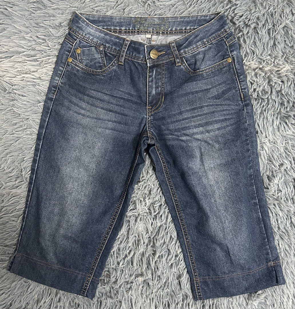 Denim Capris Shorts (Category: Shorts) located in San Mateo. Submitted by pionaaa (Listing ID 1423580885, Image 1). Description: - Stylish denim capri shorts - Classic five-pocket design - Button and zipper closure - Dark wash - Comfortable fit - Subtle cuff detail on hem - Ideal for everyday wear.