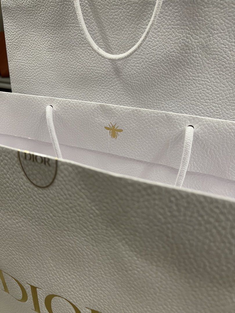 Dior Gift Bags and Boxes (Category: Luxury Bags & Wallets) located in Manila. Submitted by murafinds26 (Listing ID 1423579338, Image 2). Description: Per. Pc. ₱1500 Available for bulk order. - Authentic Dior gift packaging - Includes: - White paper bags (various sizes) with gold Dior logo - Decorative boxes with floral patterns and Dior logo - Some white boxes with Dior logo - Perfect for gifts or collectors..
