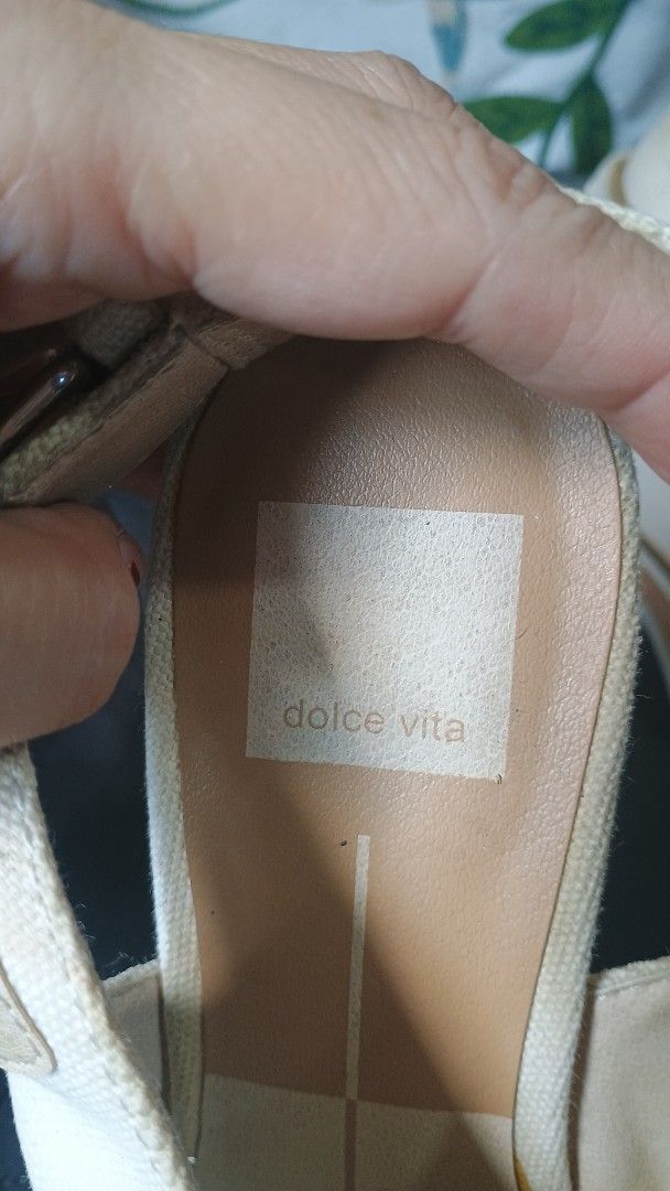 Dolce Vita White Sandals (Category: Flats & Sandals) located in Plaridel. Submitted by QualityShop (Listing ID 1423479568, Image 2). Description: - Dolce Vita sandals - White color - Cross-strap design - Buckle closure - Square toe - Light-colored soles.