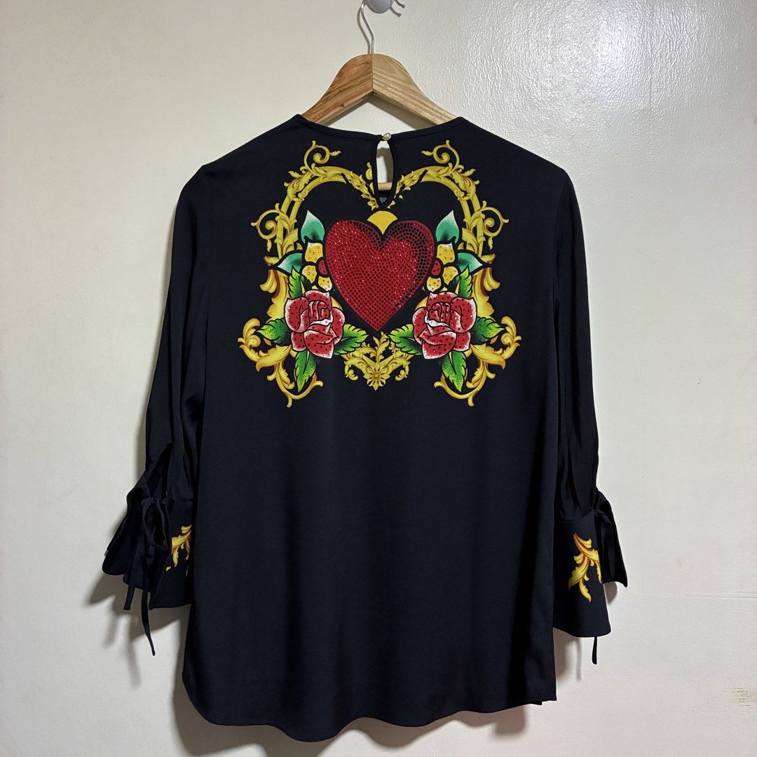 Ed Hardy Skull Print Blouse (Category: Blouses) located in Cabuyao City. Submitted by fffrag (Listing ID 1423556871, Image 3). Description: Width: 19.5" Length: 27" Sleeves: 18.5".